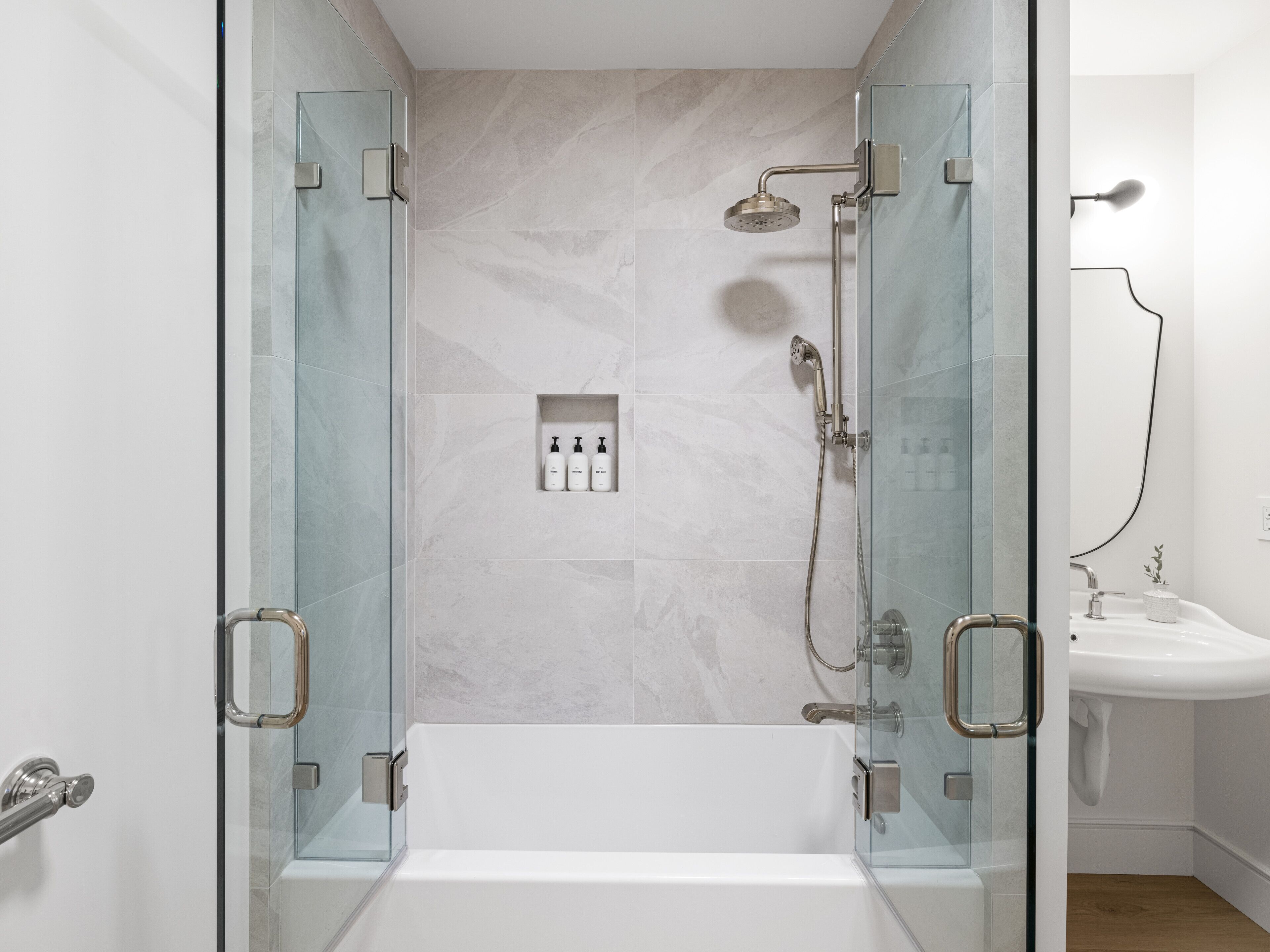 Bathtub, eco-friendly toiletries, hair dryer, towels