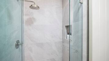 Shower, eco-friendly toiletries, hair dryer, towels