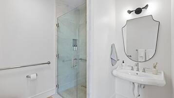 Bathtub, eco-friendly toiletries, hair dryer, towels