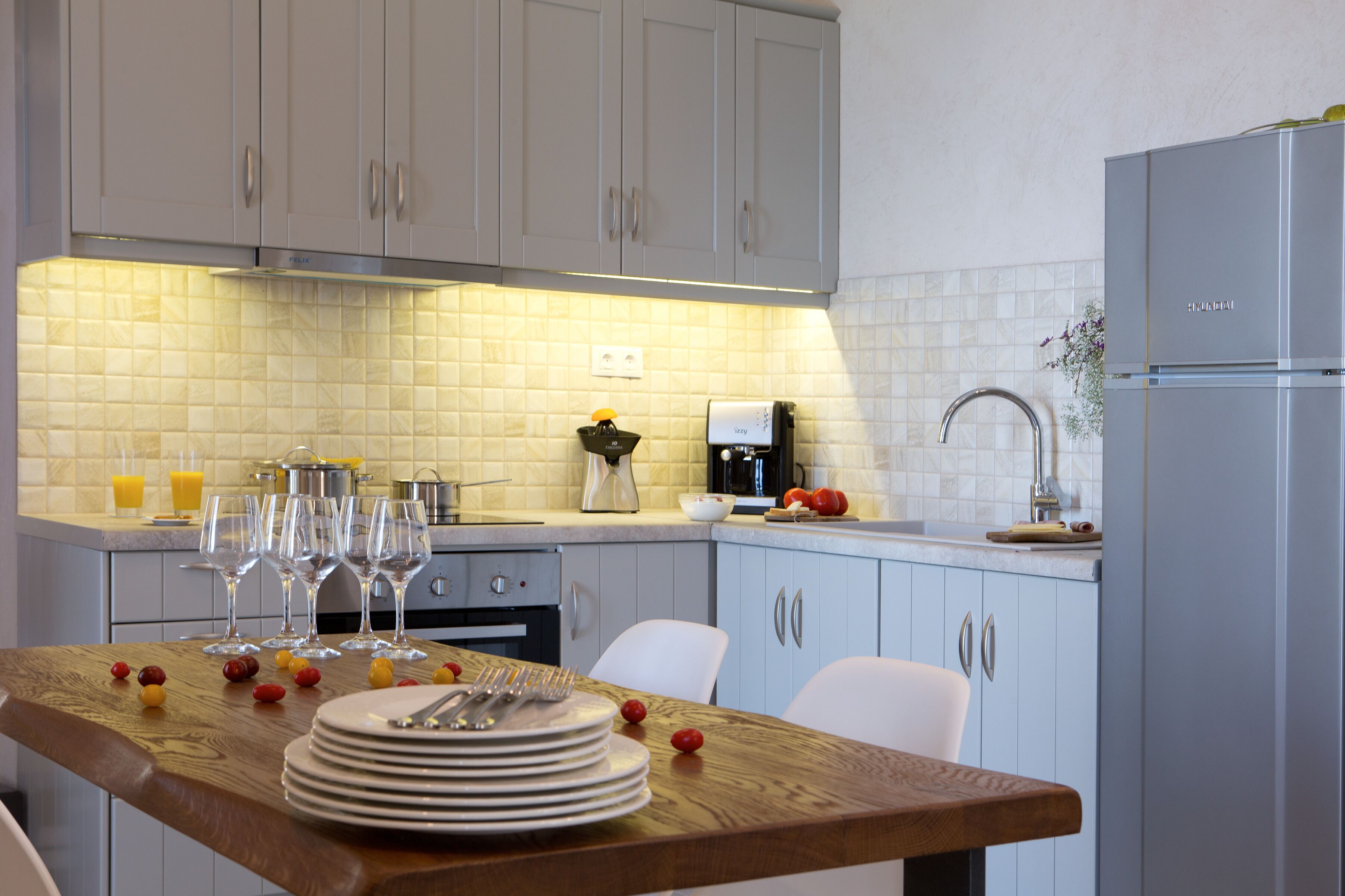 Fridge, oven, coffee/tea maker, cookware/dishes/utensils