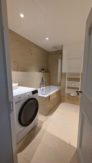 Hair dryer, towels, soap, shampoo