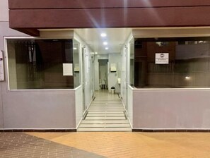Enter through the glass doors into a welcoming space.