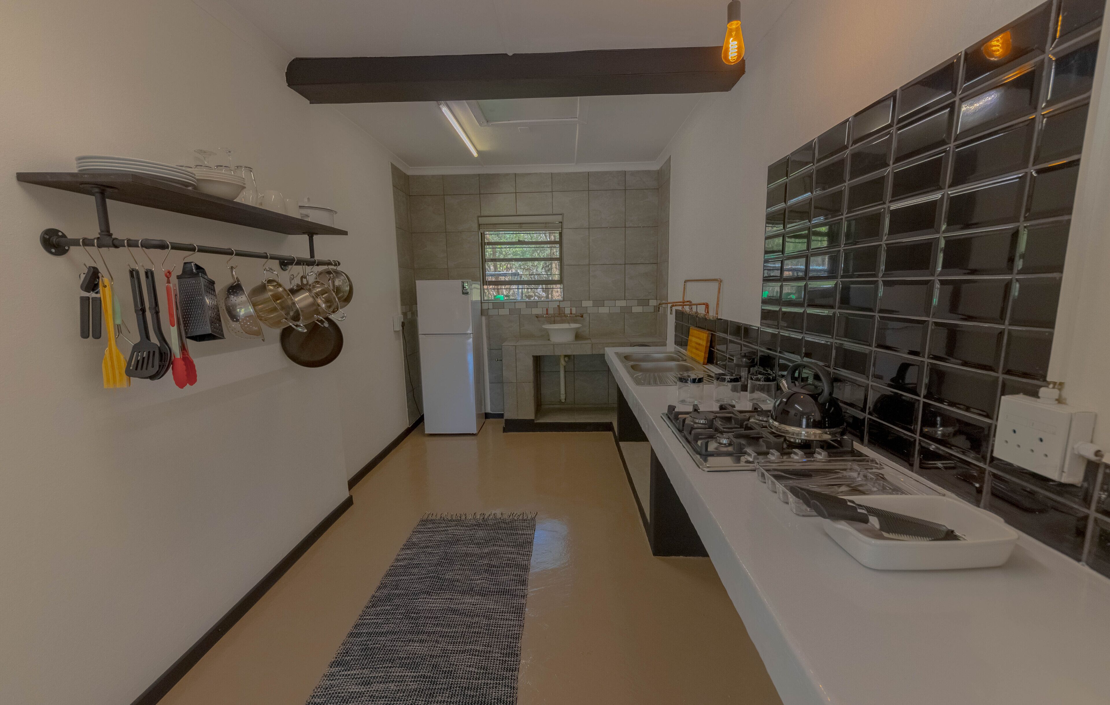 Exclusive Villa | Private kitchen | Full-size fridge, microwave, stovetop, electric kettle