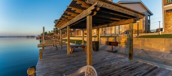 Coastal Modern Condo: Stunning Sunsets, Fishing, Pool, Private Patio, Near Beach