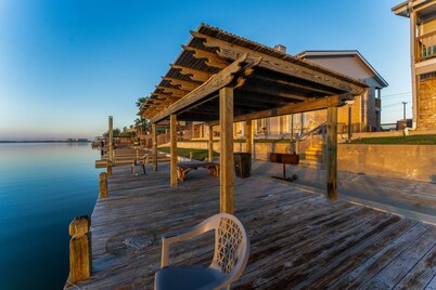 Coastal Modern Condo: Stunning Sunsets, Fishing, Pool, Private Patio, Near Beach
