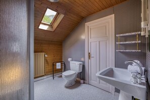 Bathtub, hair dryer, towels