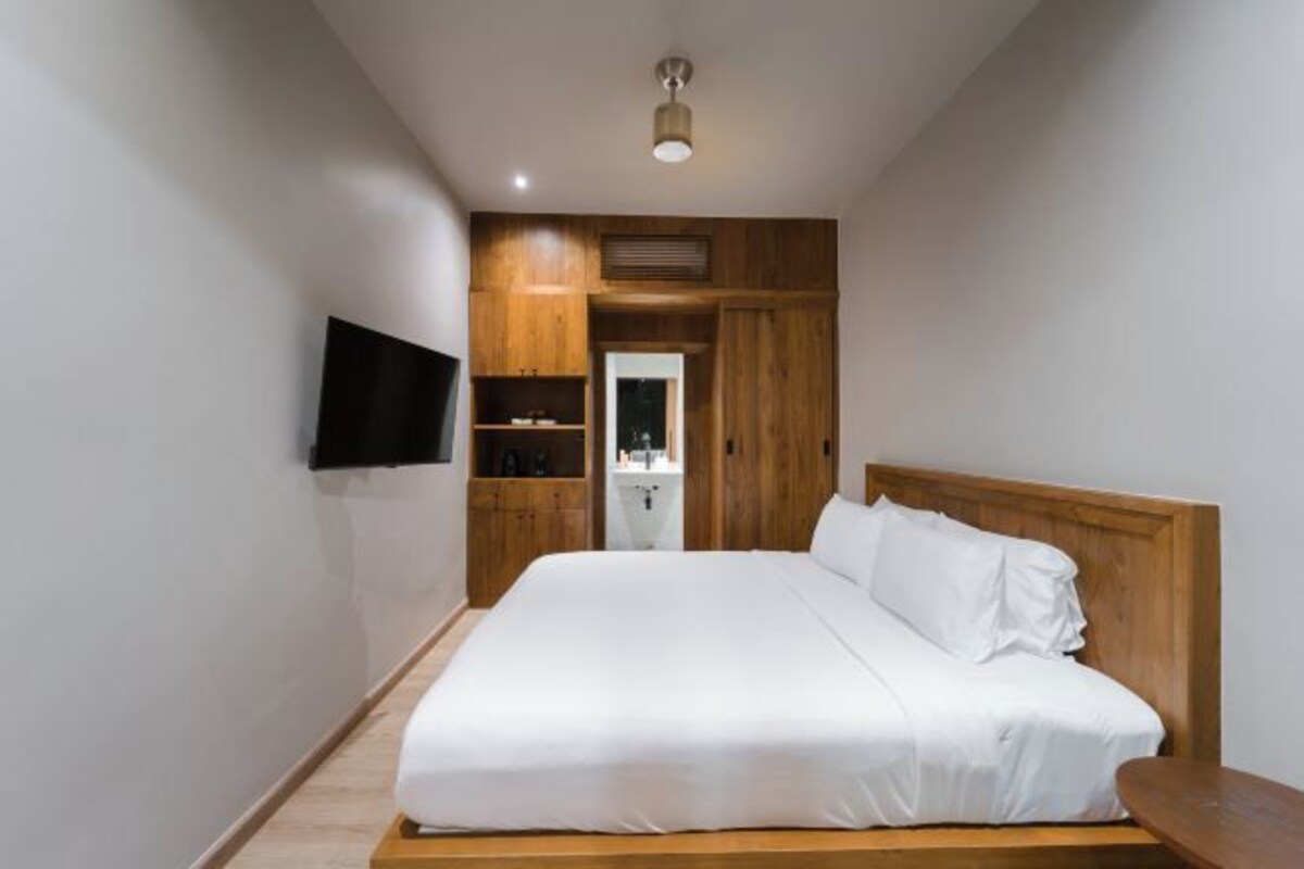 1 habitación, ropa de cama de alta calidad y minibar 