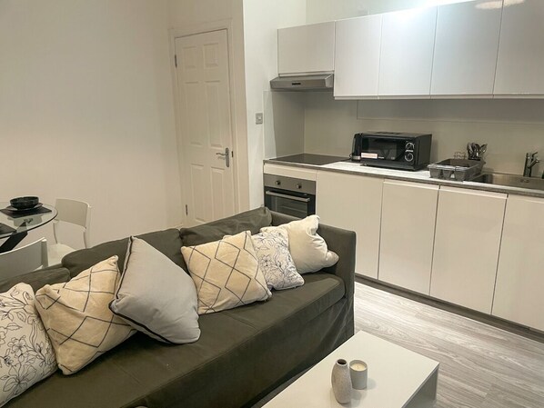 Appartement Deluxe, salle de bains privée | Bar lounge