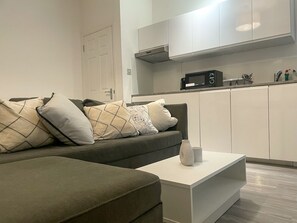 Appartement Deluxe, salle de bains privée | Bar lounge