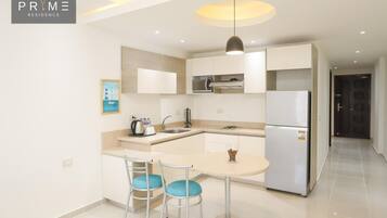 Lägenhet - 2 sovrum - utsikt mot trädgården | Badrum | Dusch, regndusch, handdukar och toalettpapper