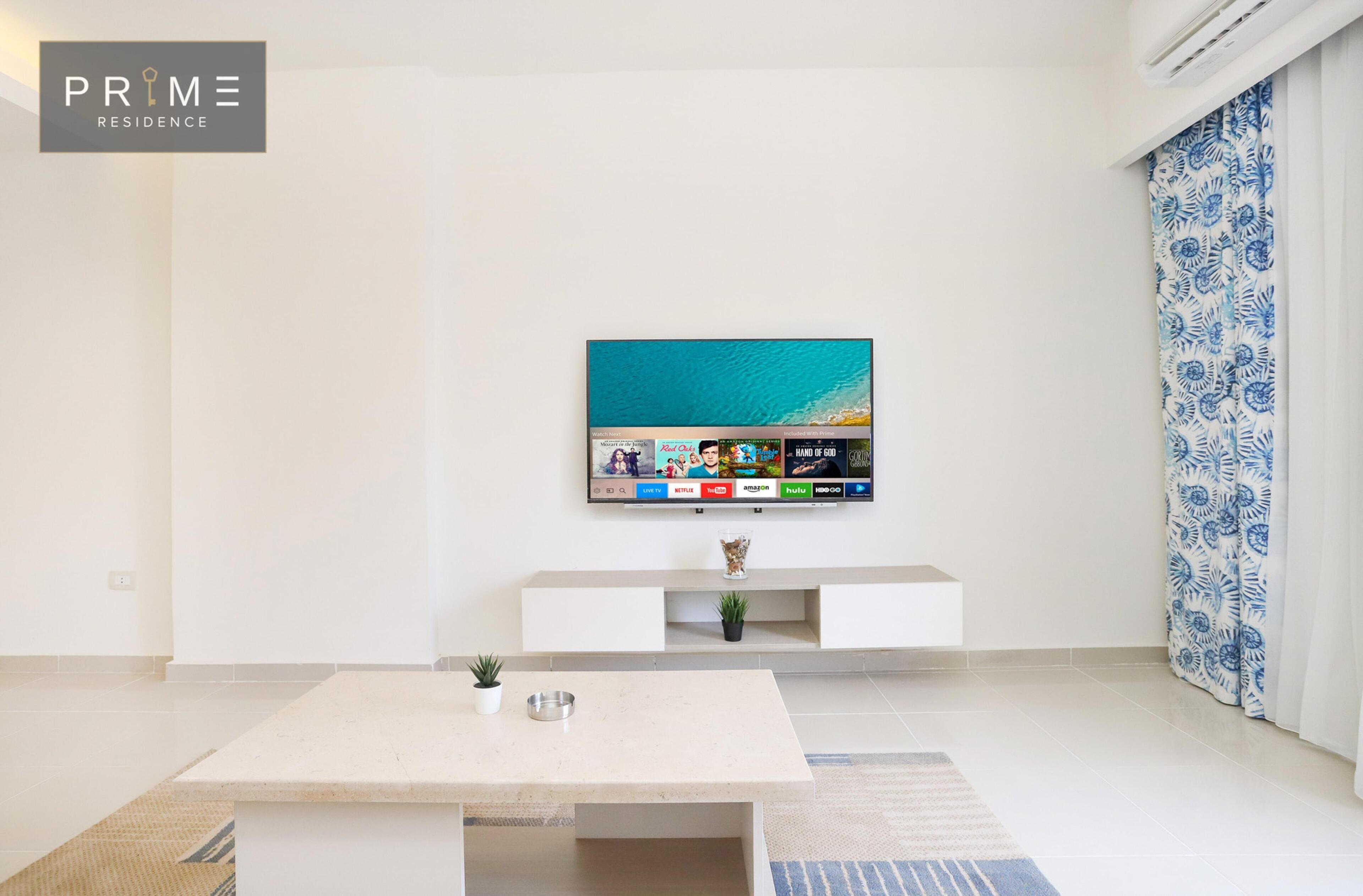 Shower, rainfall showerhead, towels, toilet paper