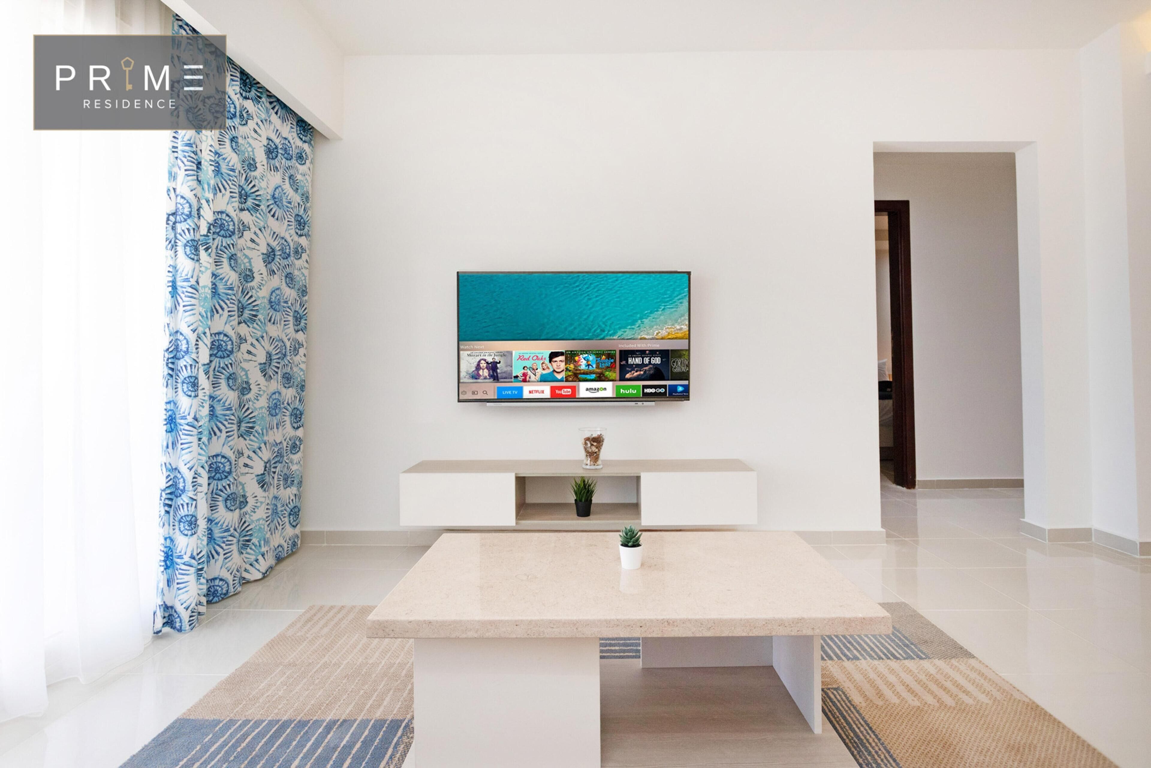 Appartement, 2 chambres, vue jardin | Coffres-forts dans les chambres, rideaux occultants