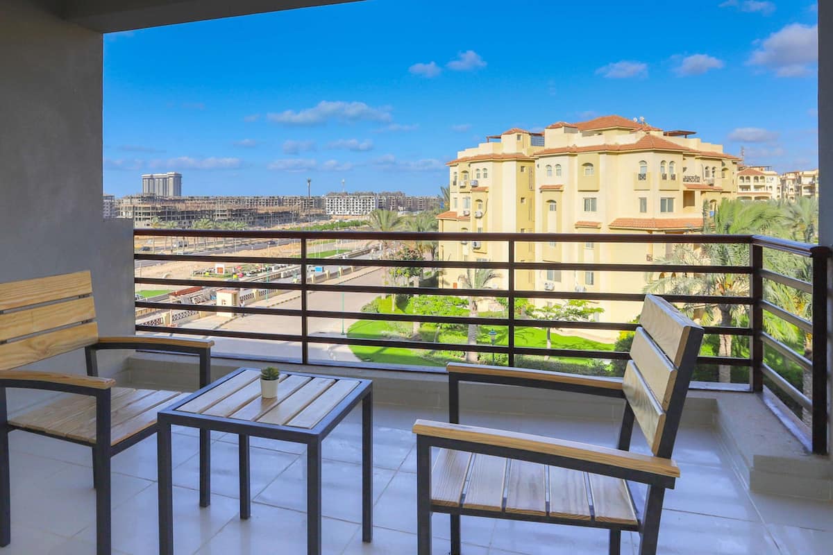 Apartment, 2 Bedrooms, Garden View | 1 bedroom, in-room safe, blackout drapes, iron/ironing board