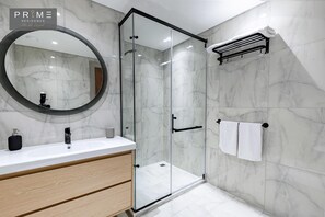 Superior Apartment, 2 Twin Beds | Bathroom | Shower, rainfall showerhead, slippers, towels