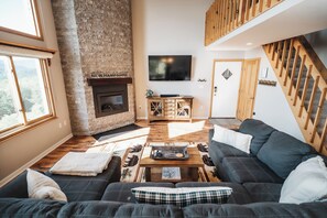 Smart TV, fireplace, table football, books