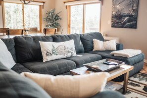 Smart TV, fireplace, table football, books