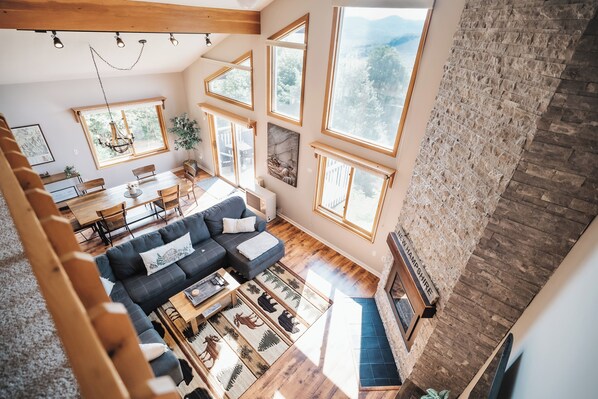 Smart TV, fireplace, table football, books