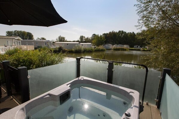Deluxe Mobile Home, Private Bathroom, Lake View | Outdoor spa tub