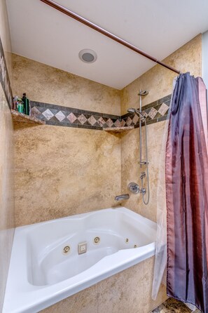 Shower, jetted tub, hair dryer, towels