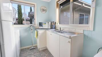 Fridge, microwave, toaster, cookware/dishes/utensils