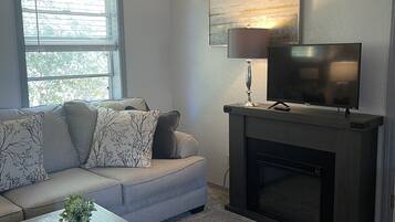 Smart TV, DVD player, books, video library