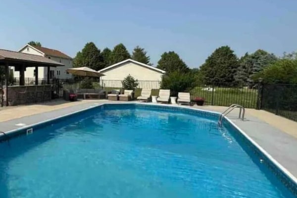 {Outdoor Pool} Soak up the sun and cool off in this inviting summer retreat.