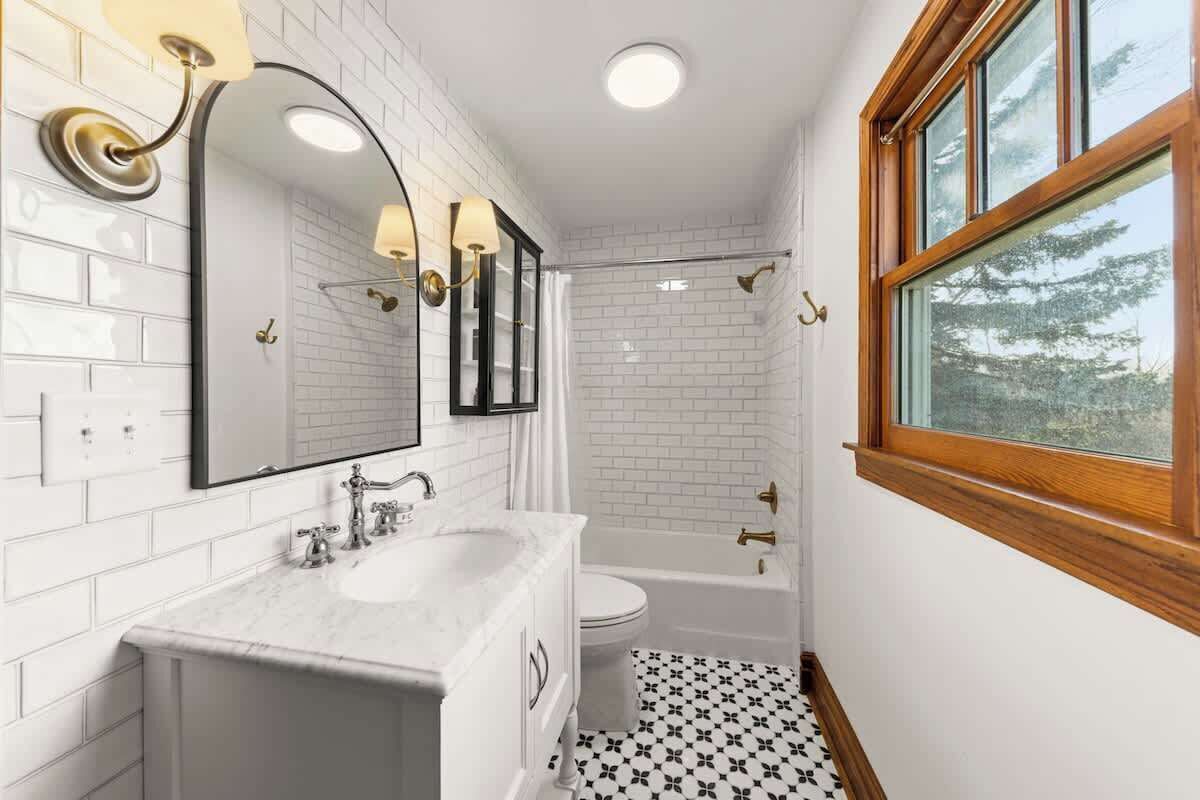 {GUEST BATHROOM} Located on the main level, off of the kitchen.