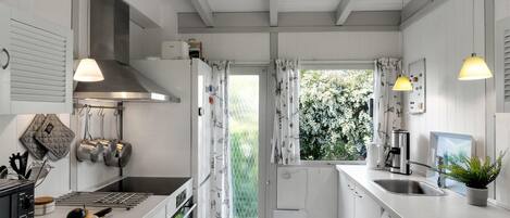 Fridge, stovetop, coffee/tea maker