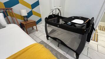 2 bedrooms, desk, iron/ironing board, travel crib