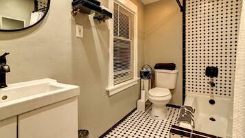 Hair dryer, towels, soap, shampoo