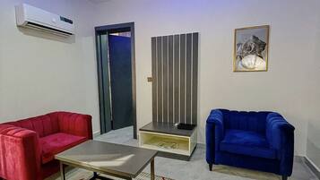 Junior-sviitti | Oleskelualue | Taulutelevisio, iPod-telakointiasema, tulostin