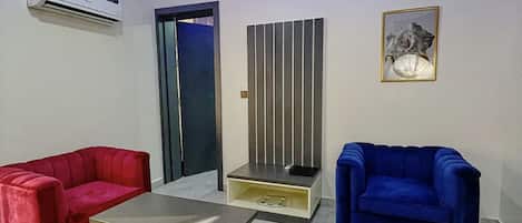 Junior Suite | Living area | 43-inch flat-screen TV with cable channels, iPod dock, printers