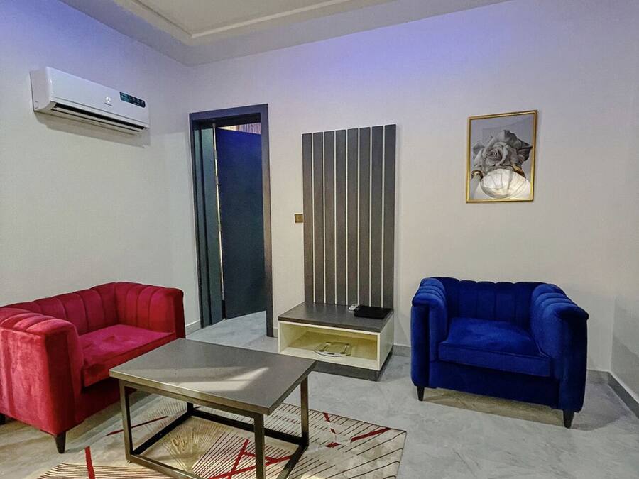 Junior Suite | Living area | 43-inch flat-screen TV with cable channels, iPod dock, printers