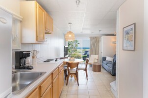 Oceanview King Suite | Private kitchenette | Coffee/tea maker, dining tables