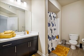 Hair dryer, towels, soap, shampoo