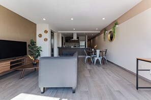 Appartement Standard | Coin séjour | Télévision à écran plat