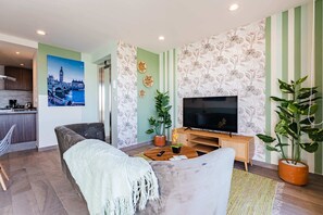 Deluxe appartement | Woonruimte | Een flatscreentelevisie