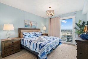 Bedroom with king sized bed, smart tv, and balcony access - 16th Floor, 5 Pools, Beach Access, Shops Onsite (Panama City Beach)