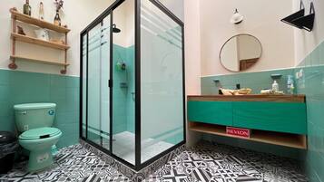 Shower, eco-friendly toiletries, hair dryer, towels