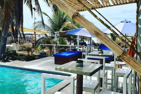 2 outdoor pools, open 7:00 AM to 11:00 PM, pool umbrellas