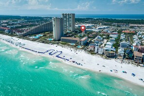 On the beach, sun loungers, beach towels