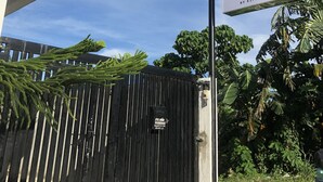 A residential building with a sign for 'Sto. Niño Residences' by St. Homobonus. - Sto. Nino Residences (Lucena)
