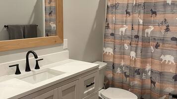 Hair dryer, towels, soap, shampoo