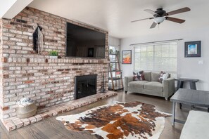 Smart TV, fireplace, music library