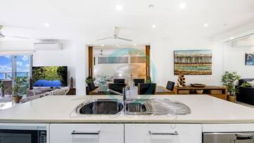 Executive Condo | Private kitchen | Fridge, microwave, oven, stovetop