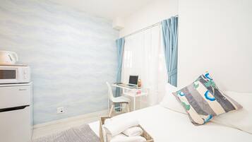 Basic Apartment, 1 Twin Bed, Microwave (102) | 1 bedroom, desk, laptop workspace, free WiFi