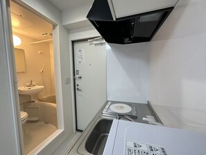 Junior Apartment (303) | Private kitchen | Mini-fridge, microwave