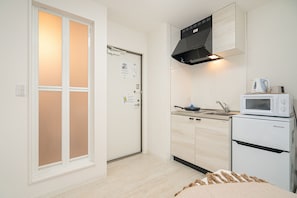 Basic Apartment (202) | Private kitchen | Mini-fridge, microwave