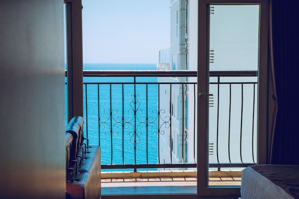 Family Room, 2 Queen Beds, Balcony, Partial Sea View | Living area | 43-inch flat-screen TV with digital channels, TV - Morris Hotel Nha Trang (Nha Trang)