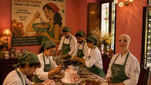 A group of people in aprons working at a table with baking tools and ingredients, a cake, and a sign that reads 'Villa Oleandra Corsi di Cucina.' - Villa "Luxury Oleandra" with Private Pool, Big Garden and Barbecue (Dizzasco)